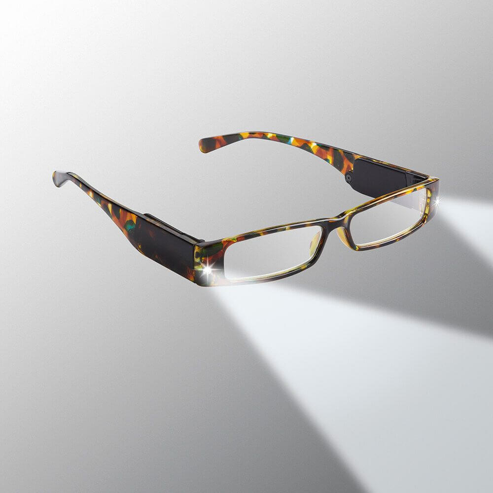 Tortoiseshell-framed eyeglasses on a gray background