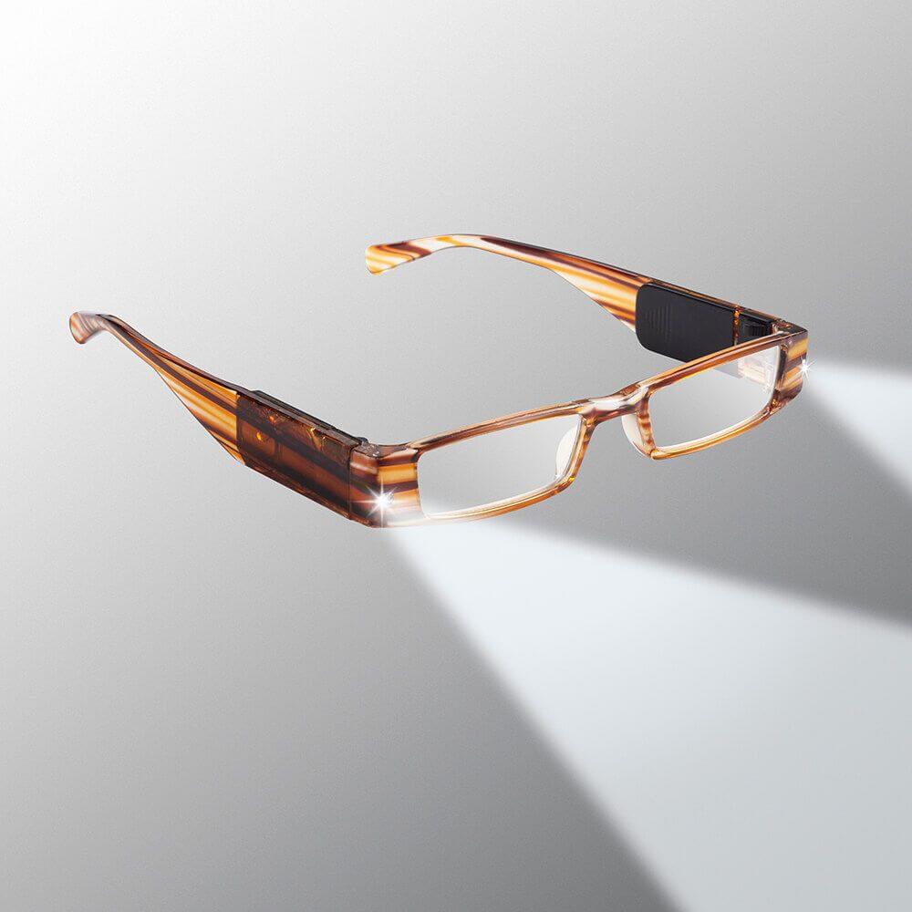 Brown eyeglasses on a gray background