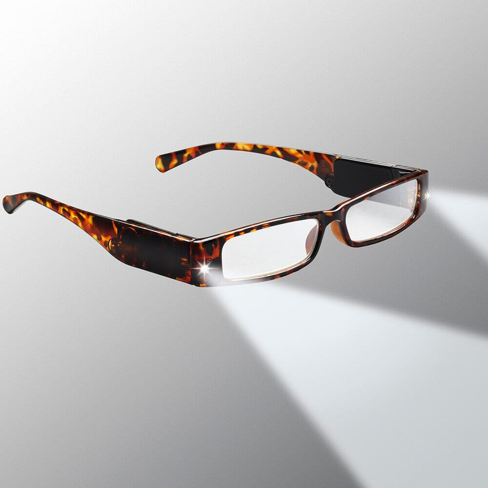 Tortoiseshell eyeglasses on a light gray background