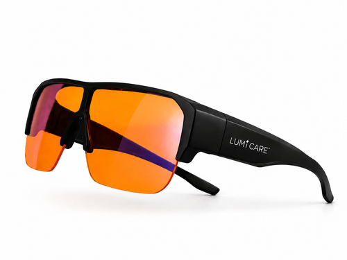 Black wrap-around sunglasses with vibrant orange mirrored lenses and a visible LUMI-CARE logo on the temple arm, set against a clean white background.