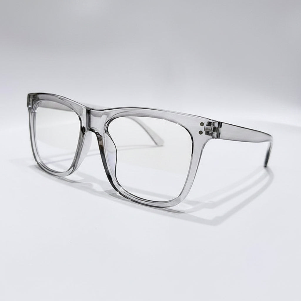 Clear eyeglasses on a gray case with a white background